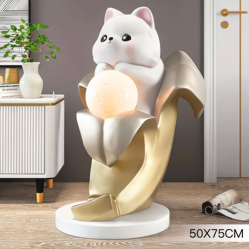 Chat Mignon dans une Banane Tenant une Balle ampoule de Lampe Or
