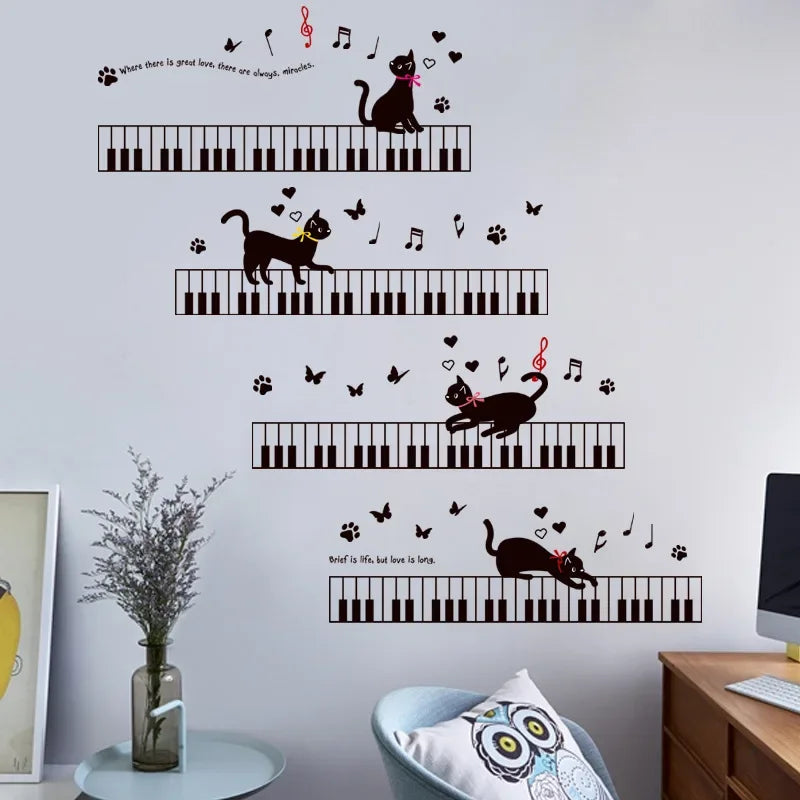 Chat jouant sur des Claviers Piano et Notes de Musique Noir et Rouge Autocollants