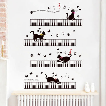 Chat Joueurs se Promènent sur Claviers de Piano Notes Papillons Sticker